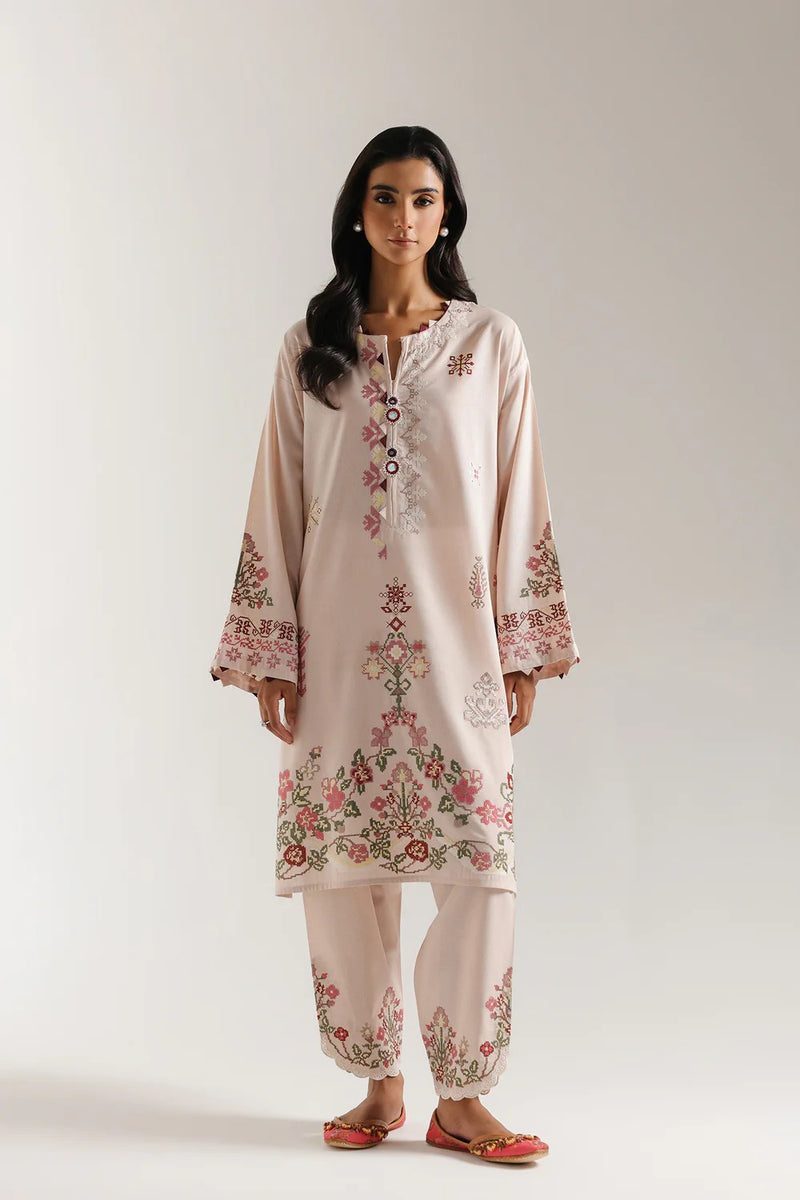 Pale coral embroidered 2-piece stitched suit with floral detailing on neckline, front and hem
