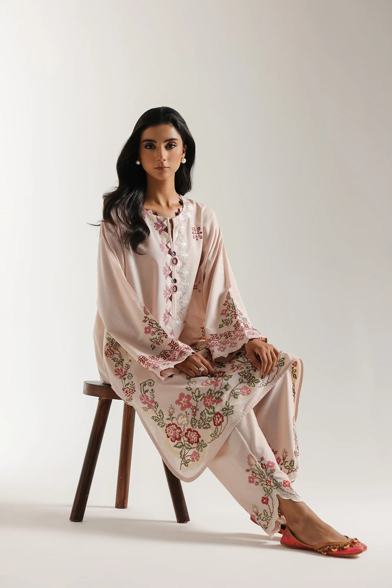 Pale coral embroidered 2-piece stitched suit with floral detailing on neckline, front and hem